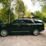 SWIFT LIVERY FIRST CLASS BLACK SUV LIMO